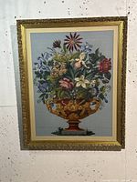 Full view of framed floral tapestry showing colors and overall presentation.