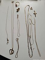 Overview of all jewellery items laid out on white background