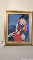 Framed limited edition Red Skelton clown violinist print with gold frame and plaque