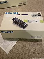 Box of Philips Pronto TSU9400 home control panel system with product photo and branding on lid.