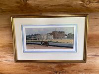 Overall view of framed print showing the Royal and Ancient Golf Club at St. Andrews with gold frame and double matting