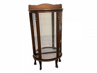 Front and side view of the vintage curved glass wooden display cabinet showing the missing side glass panel and visible interior mirrored back.