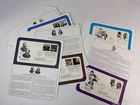 Stack of six informational pages showing mounted first day covers