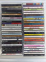 Full view of two vertical stacks showing 36 CD spines