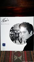 Front of the Royal Doulton Elvis collector plate original box showing Elvis Presley images and branding.