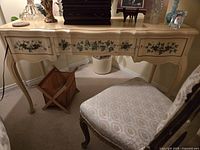 Photo of Victorian French Provincial bedroom chair showing gilt carved frame and silk upholstered seat and backrest in cream and gold floral pattern.