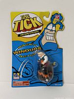 Front view of packaged 'The Tick Time Bomb Dyna-Mole' wind-up toy sealed in original packaging.