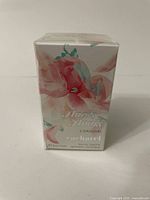 Front of box showing Anais Anais perfume branding with floral artwork, labeled 30ml Eau de Toilette by Cacharel.