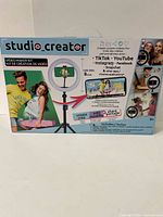 Front of box showing kit components and promotional images.