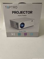 Front view of the Toptro projector box showing product image, model number TR81, and warranty/feature icons.