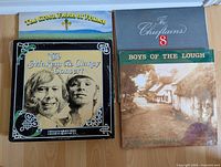 Photo showing 4 vinyl LP covers: The Green Fields of France, The Chieftains 8, The Makem & Clancy Concert, Boys of the Lough