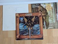 Photo showing three Jethro Tull LP album covers: M.U. The Best of Jethro Tull, Aqualung, and Thick as a Brick.