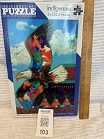 Front of the puzzle box showing eagle artwork and branding for Indigenous art puzzle with 1000 pieces.