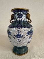 Front view of vase showing overall shape and dragon design