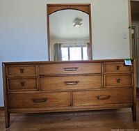 Full frontal view of oak veneer dresser with mirror attached