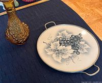 Photo showing vintage MCM amber glass decanter with fruit texture and ceramic grapevine cake plate