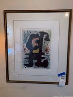 Full front view of framed lithograph showing entire composition, mat and frame