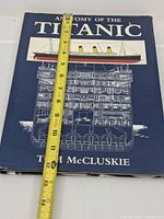 Hardcover book titled 'Anatomy Of The Titanic' with navy blue cover and detailed cross-sectional illustration of the ship.