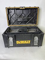 Front view of DeWalt TOUGHSYSTEM 12 inch toolbox open showing interior tray and metal latches.