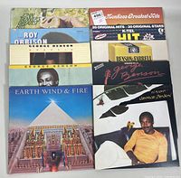 Overview of 10 vintage record albums from various artists including Earth Wind & Fire, George Benson, Roy Orbison, John Denver, Monkees.