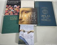 Five vintage art and history reference books displayed on a white surface.