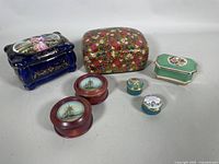 Grouped image of all seven vintage trinket and storage boxes including largest Kashmir lacquer box and smallest pill boxes