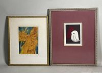 Two framed prints side by side on a white background, one with a couple and ox in color, one with two birds.