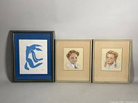 Framed pair of pastel portraits and Henri Matisse print shown together, frames show wear.