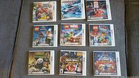 Top-down view of all 9 Nintendo 3DS game cases laid out in a grid showing front cover art.