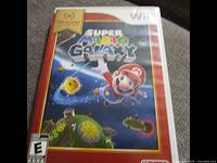 Front cover of Super Mario Galaxy Nintendo Wii game case showing the game title and artwork with Mario in space.