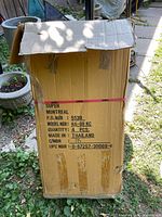 Closed cardboard box containing 4 pieces of chairs with model and country of origin data.