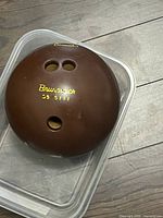 Top view showing drilled finger holes and Brunswick logo