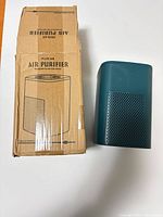 air purifier beside original box