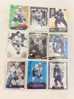 Front view of nine sleeved Morgan Rielly cards arranged 3×3