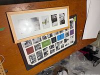 Two collage frames on table showing sizes and colors