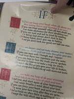 Close-up of poster showing decorative text and color