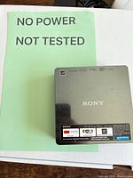 Top view of Sony SMP-NX20 player with notice of no power/not tested