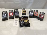 Photo showing 7 NHL mini hockey sticks in black packaging with player names and numbers visible. The players represented are Matthews, Ovechkin, Subban, Crosby, Malkin, McDavid, and Price.