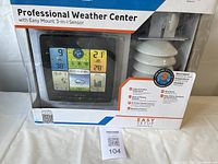 Front of box showing the weather center display and features