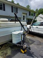 BikeWing camper bike rack attached to camper hitch showing front and side views.