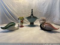 Five Hull Pottery pieces: two cornucopia planters and three vases, all ceramic with detailed glaze and no visible chips or cracks.