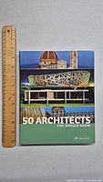Front cover of the book showing architectural landmarks and title.