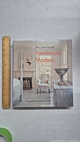 Front cover of the Farmhouse Modern book showing interior design photo and title.