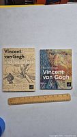 Front covers of both Vincent van Gogh books placed side by side with a ruler below for scale.