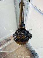 Crab figurine detail on yatate end