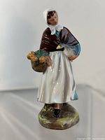 Front view of Royal Doulton Country Lass figurine