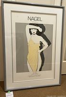 Full view of the framed serigraph print showing the female figure and details including title 'Nagel Serigraph'