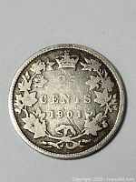 Close-up image of the 1901 Canadian 25 cent silver coin showing the reverse side with denomination, date, crown, and maple leaf wreath.