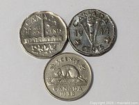 Three Canadian 5 cent nickels arranged with obverse designs visible: 1938, 1944, and 1951 coins.