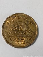 Reverse side showing beaver on log with denomination and date